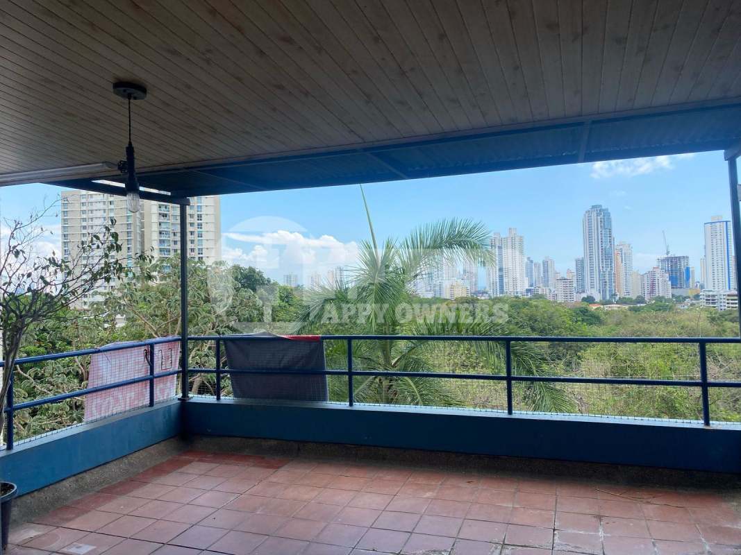 Covered balcony with panoramic view at PH Lomas Carrasquilla Panama City