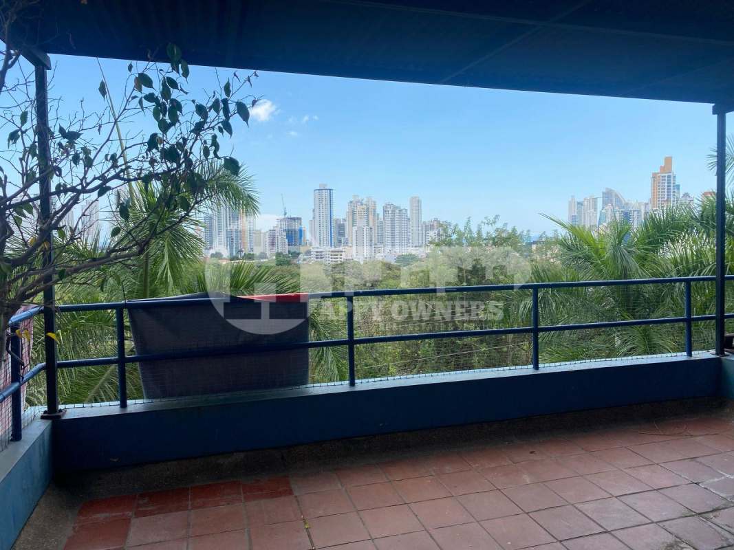 Terrace overlooking Parque Omar and city skyline in PH Lomas Carrasquilla Panama