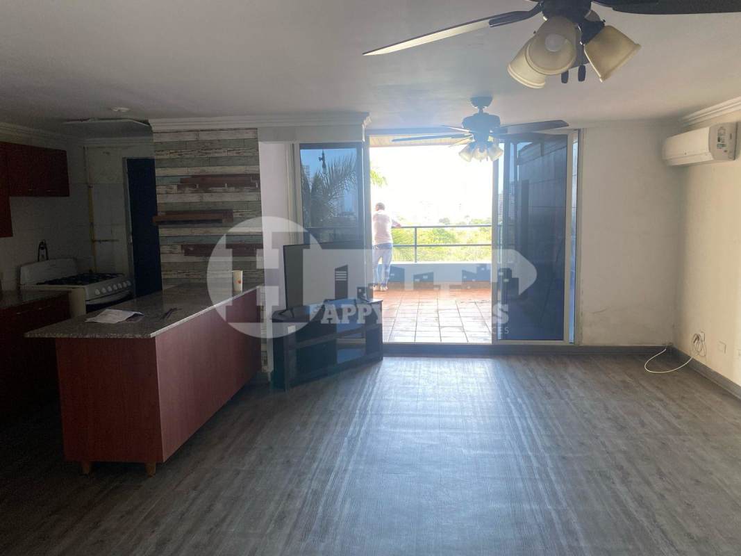 Living room open plan with balcony view and AC in PH Lomas Carrasquilla Panama City