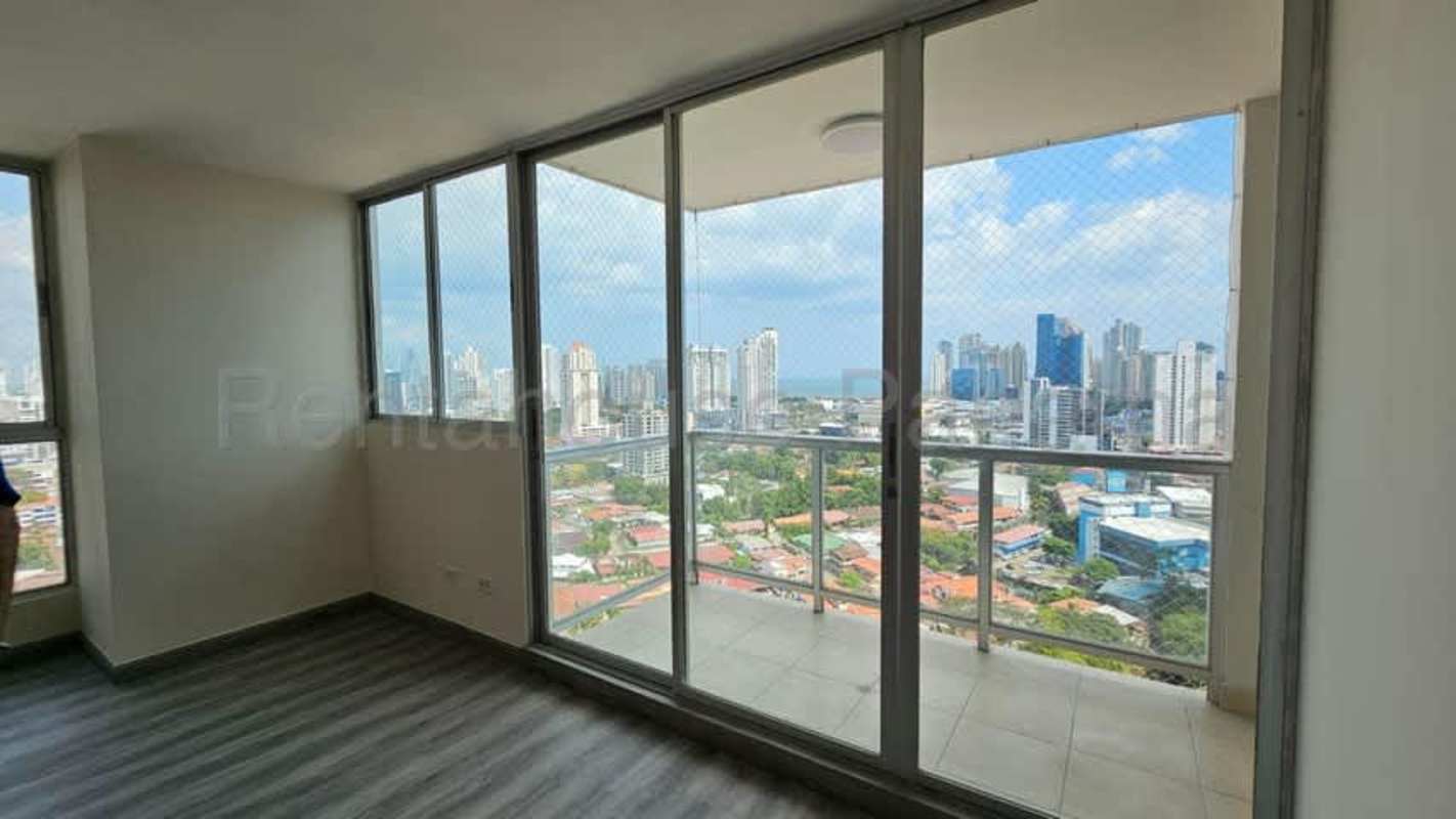 Contemporary kitchen with island, marble-look counters, wood cabinets in PH Riverside Tower