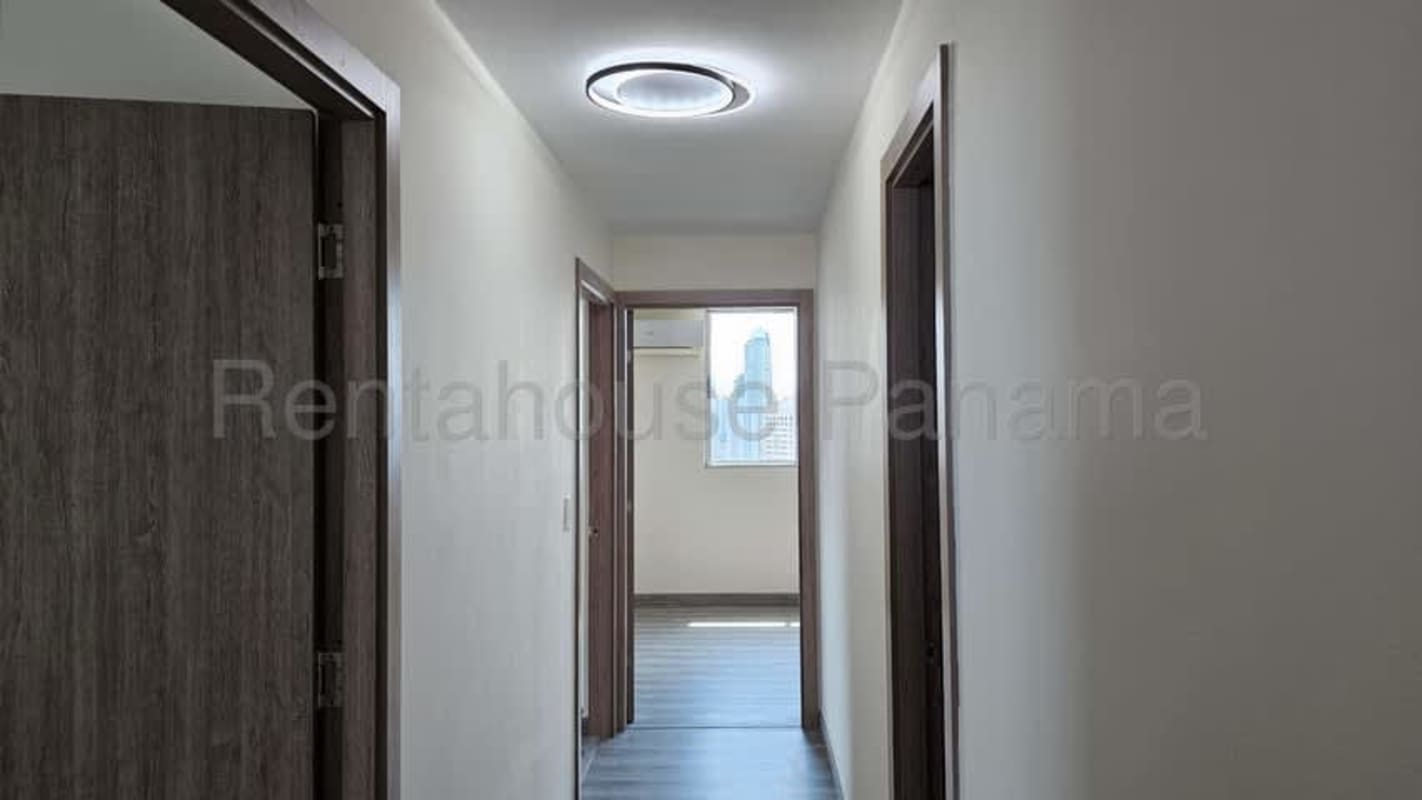 Rooftop swimming pool with city skyline view at PH Riverside Tower Panama