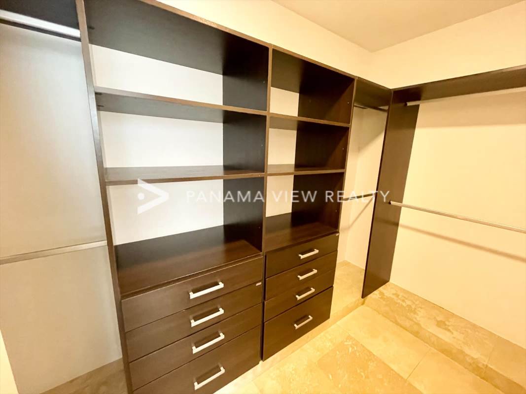 Spacious covered terrace with view of landscaped backyard and golf course Fairway Estates Panama