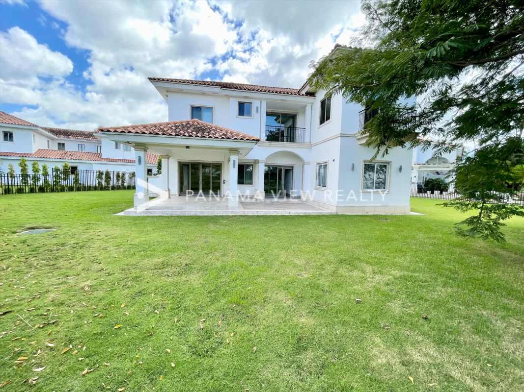Large marble floor living room with double-height ceilings and staircase Fairway Estates Santa Maria Panama