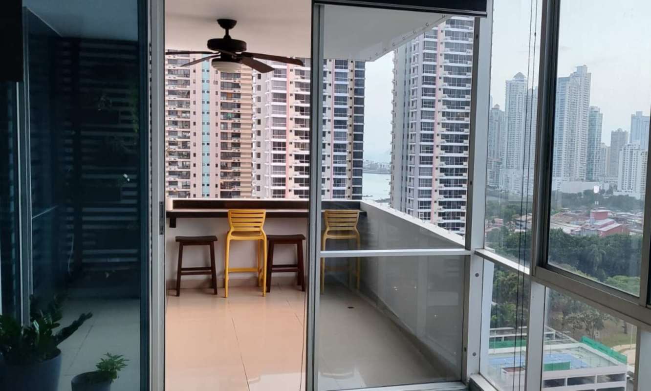 Bright furnished living area with balcony view at PH Waterview San Francisco Panama