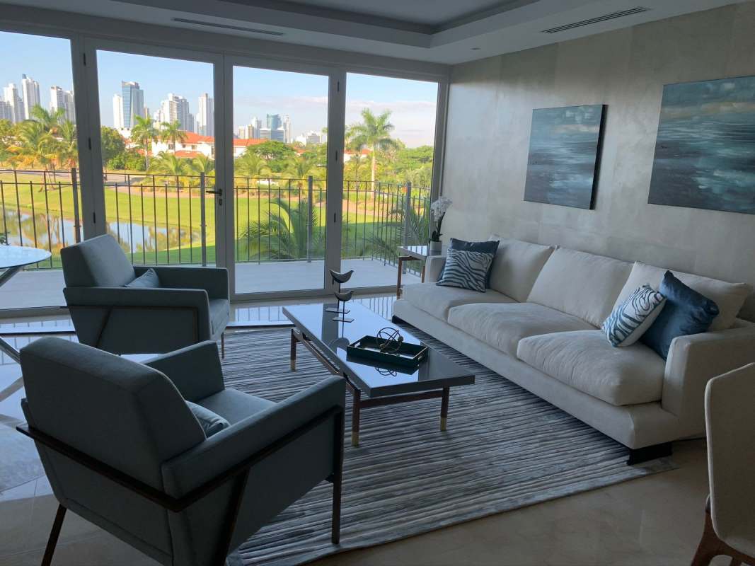 Open living dining space with city view and balcony in PH Ocean House Santa Maria Panama