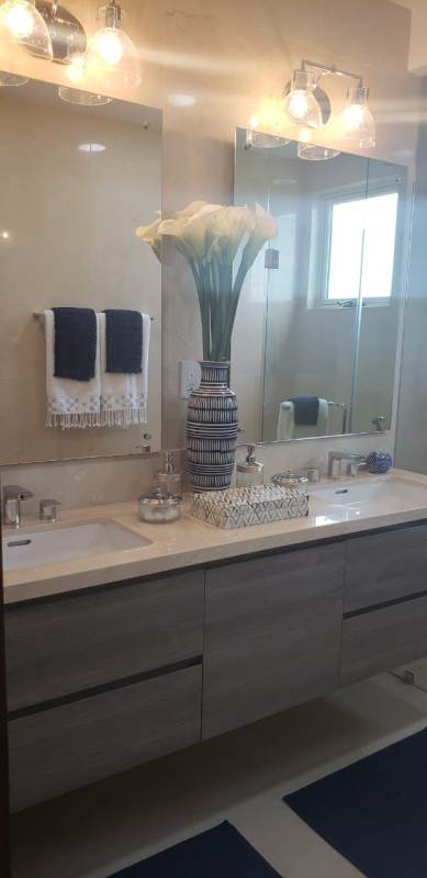 Contemporary bathroom with glass shower enclosure, marble countertop in PH Ocean House Santa Maria Panama