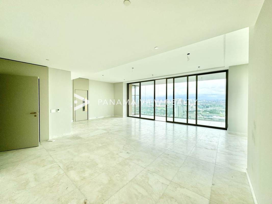 Italian Fendi Casa kitchen with marble island and floor-to-ceiling windows at La Maison by Fendi in Panama