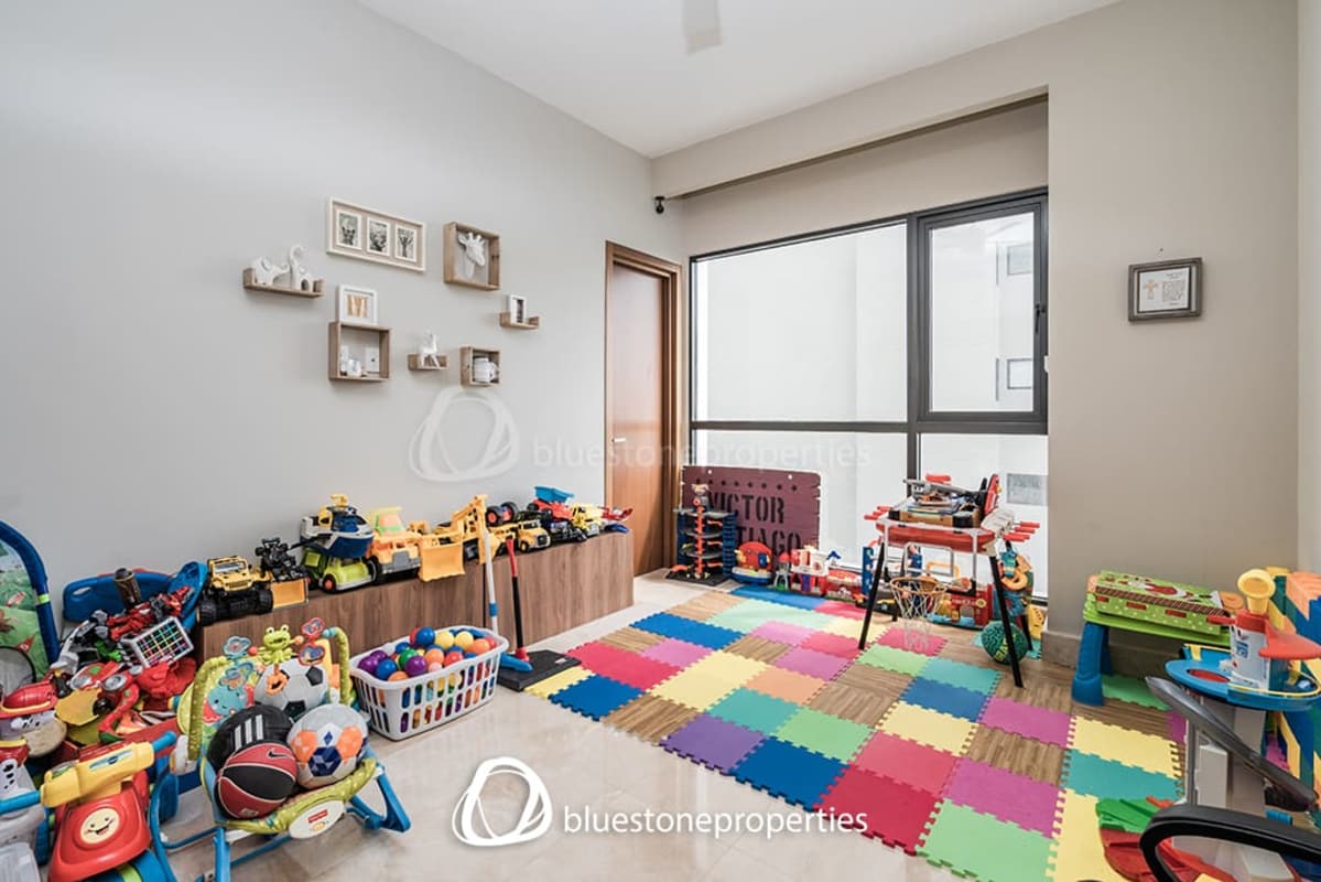 Large balcony with seating area overlooking golf course and Pacific Ocean Santa Maria condo Panama