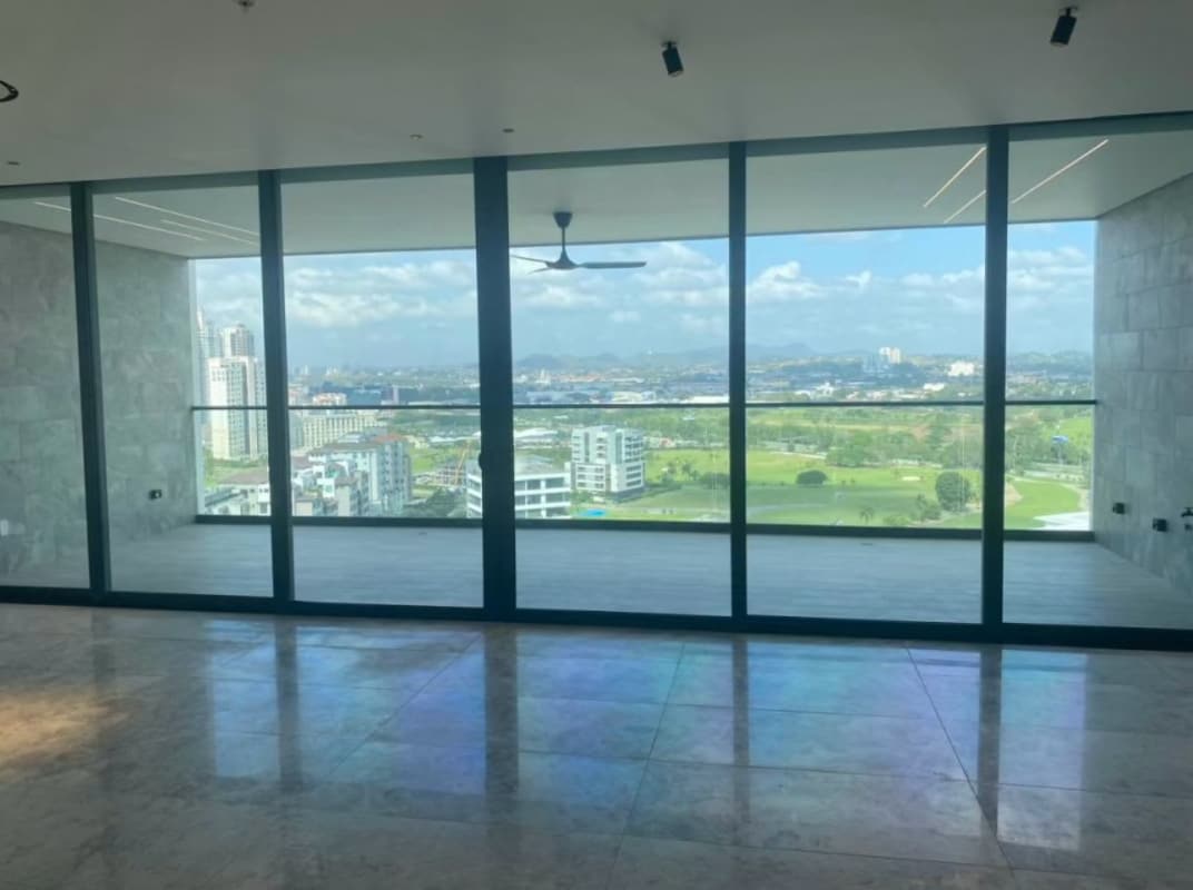 Fully equipped closed kitchen with granite counters at Empire Residences Santa Maria