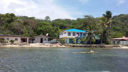 Bright traditional living dining area in beachfront villa for rent in Portobelo