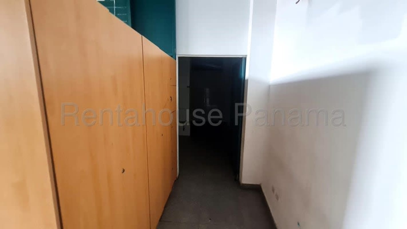 Mezzanine loft with glass railing and wood floor commercial property Panama