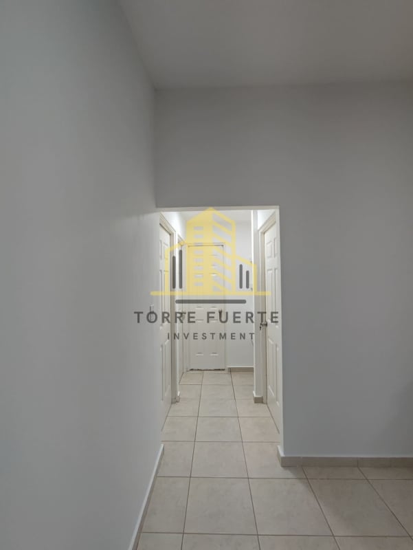 Master bedroom with ensuite bathroom, closet and AC unit in Brisas del Golf house Panama