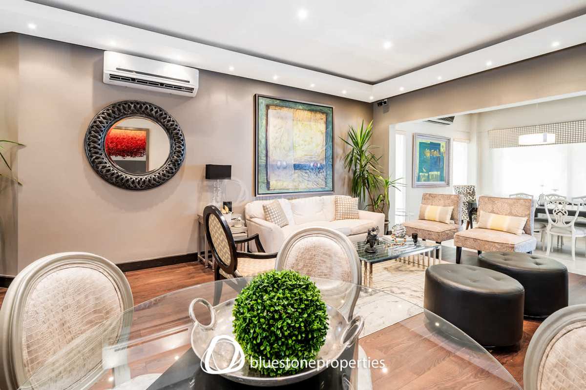 Dining room with large windows overlooking garden luxury home Panama City