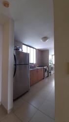 Bedroom with large window, ceiling fan, AC unit and ocean view PH Los Balcones Playa Blanca