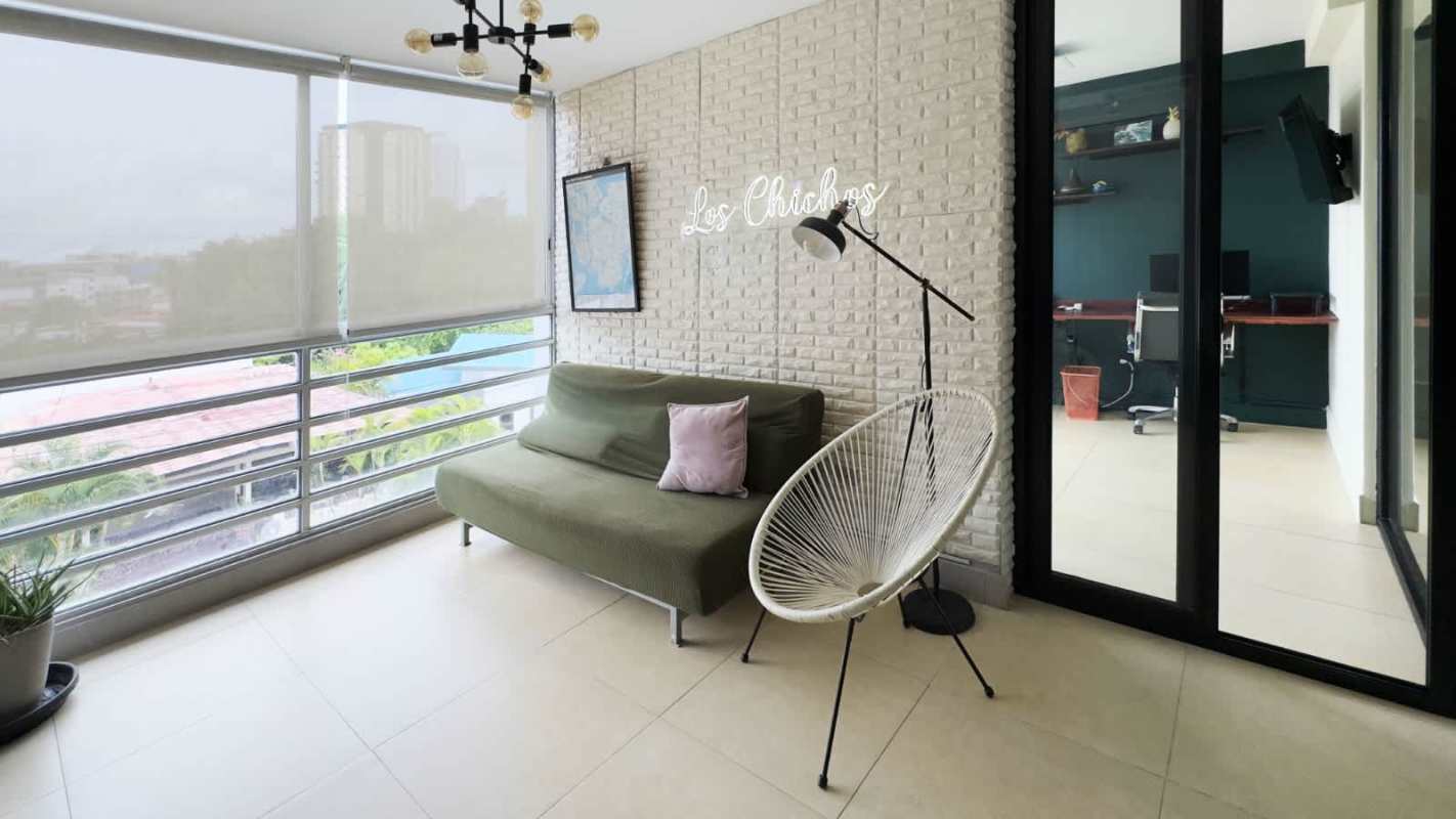 Small enclosed balcony in PH Villa Cáceres with city neighborhood view Betania Panama City