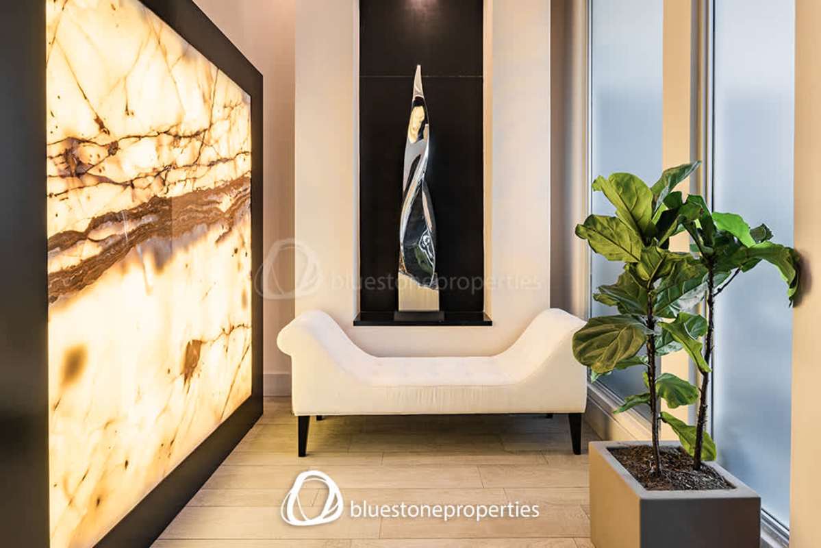 Double height elegant living area with chandelier in luxury Panama villa