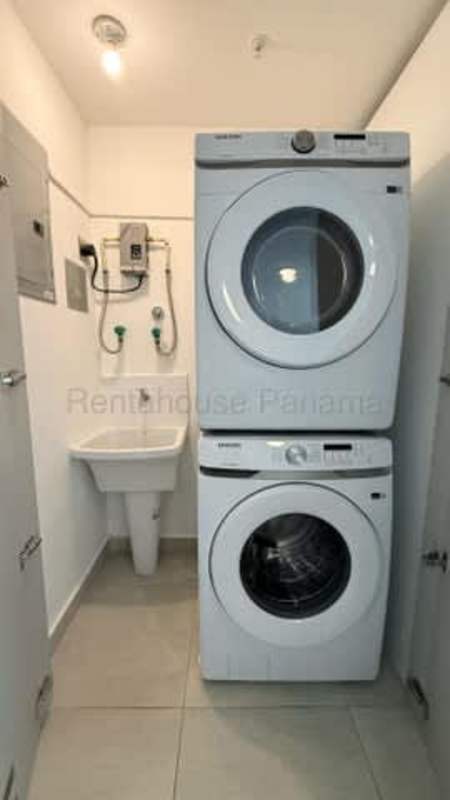 Compact laundry area with tile floor rental apartment Bella Vista Panama City