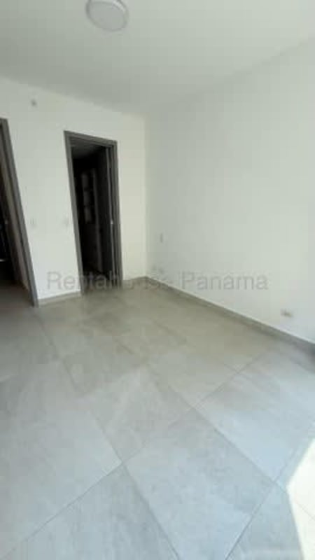 Clean ceramic tile bathroom with glass shower in PH Van Gogh rental apartment