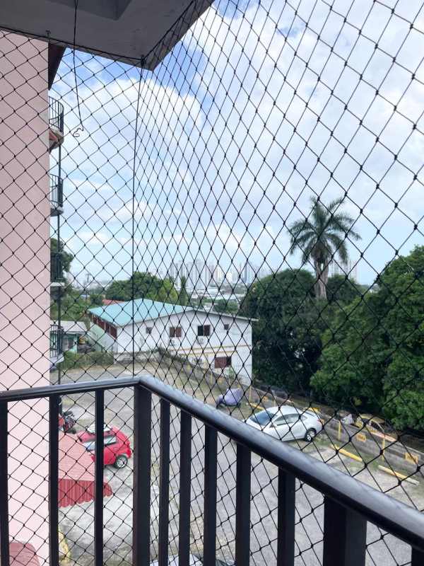 Secure gated entry with parking lot and landscaping in Vista Hermosa Rio Abajo Panama apartment building