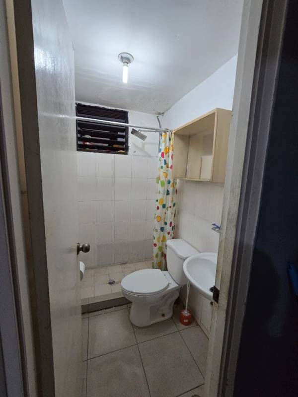 Parking lot in front of multiple apartment blocks with balconies in Rio Abajo Panama