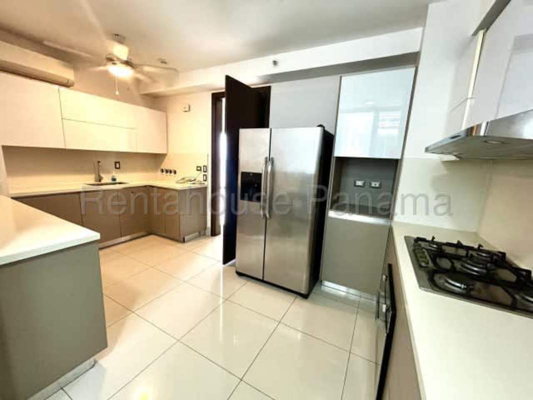 Modern gym with cardio and weights overlooking ocean Costa del Este