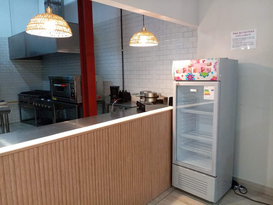 Professional commercial kitchen with stove, oven, and refrigerator ready for restaurant use Casco Viejo Panama