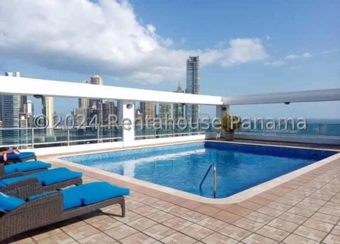 Modern gym with ocean view windows PH Bayfront Tower Panama City