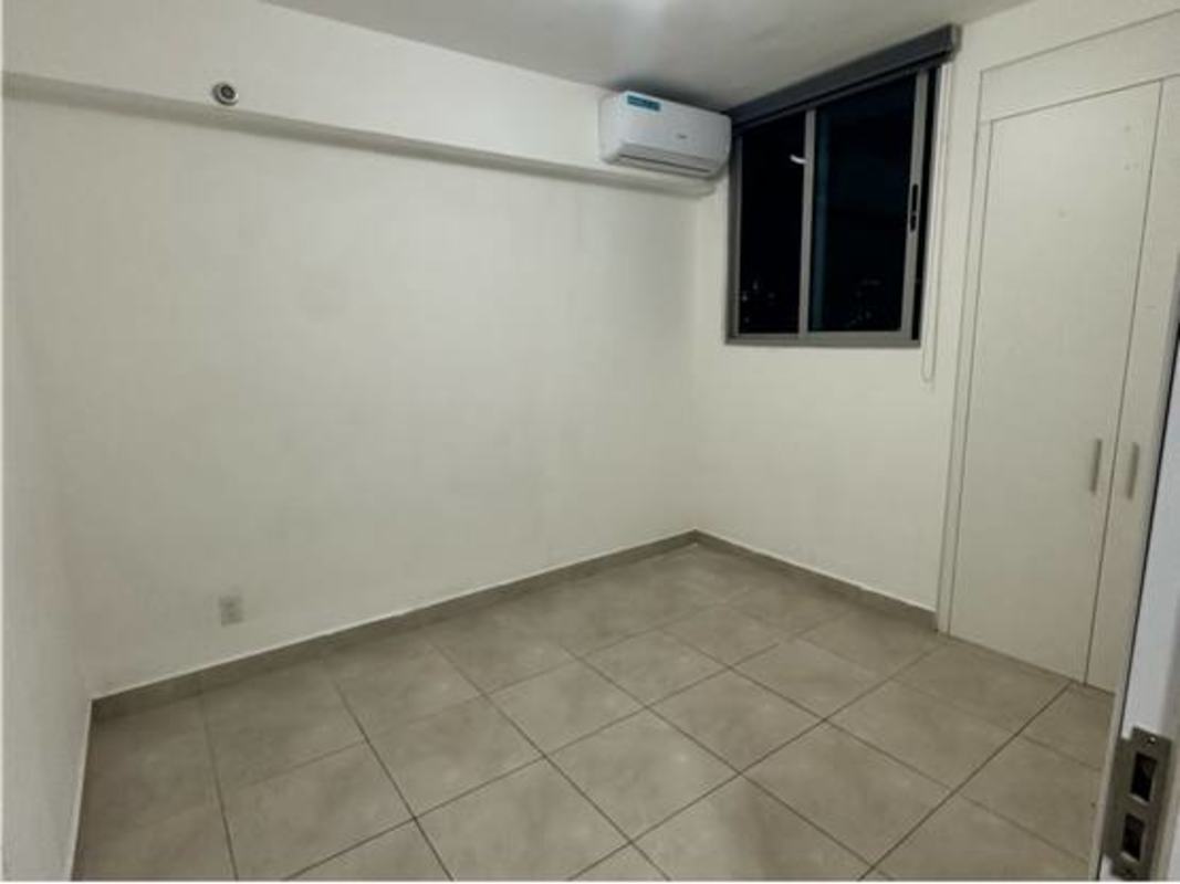 Bedroom with ceramic tile and built-in closet PH Alai