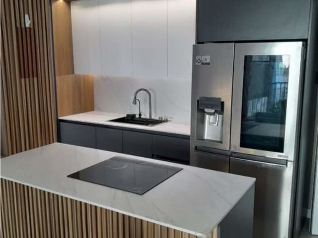 Spacious open-plan living dining area with balcony at PH Alai Juan Díaz Panama