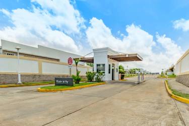 Gated community entrance security booth with canopy at PH Mirador del Mar Costa Verde