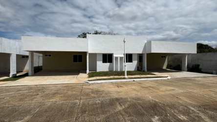 Street view minimalist single-story townhouses with driveway PH Mirador del Mar in Costa Verde Panama