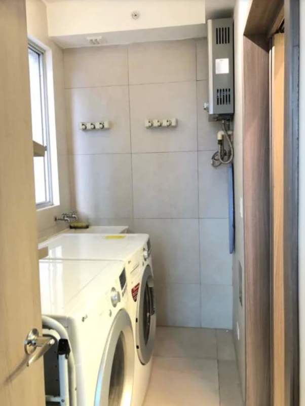 Fully equipped kitchen with granite countertops and appliances at PH Dos Mares Villa de las Fuentes Panama