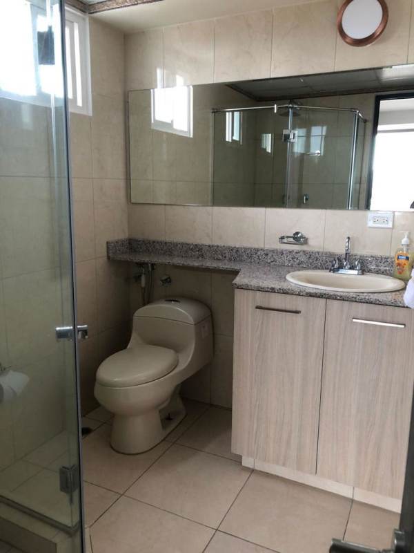 Bathroom with granite vanity, glass shower enclosure PH La Sabana Panama