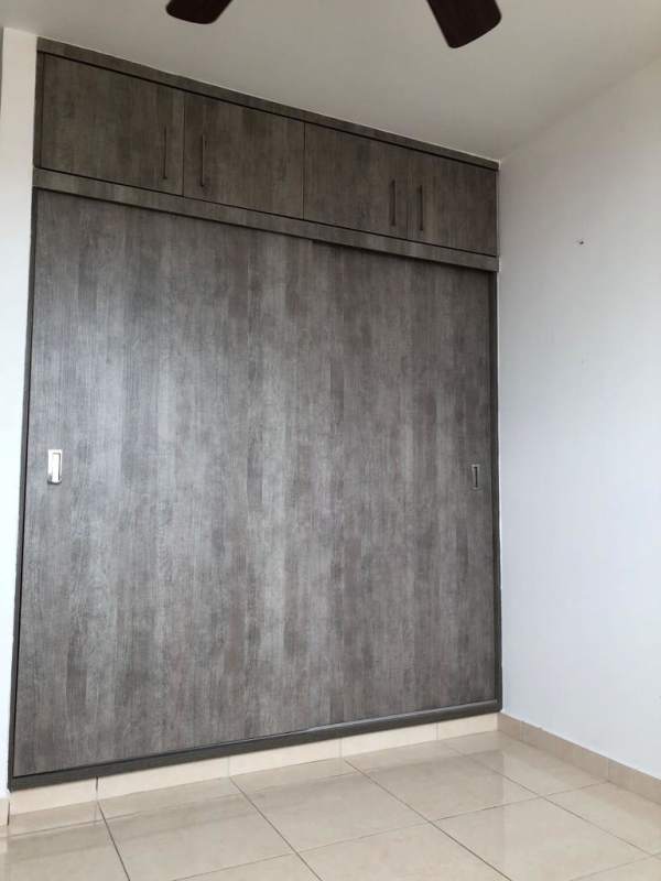 Spacious bedroom with wardrobe, ceiling fan furnished PH La Sabana Panama