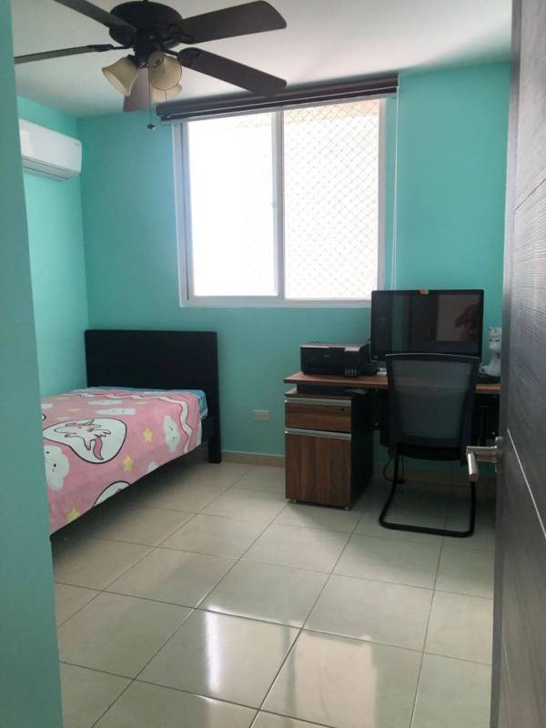 Bathroom with glass-enclosed shower and granite countertop vanity at PH La Sabana Panama