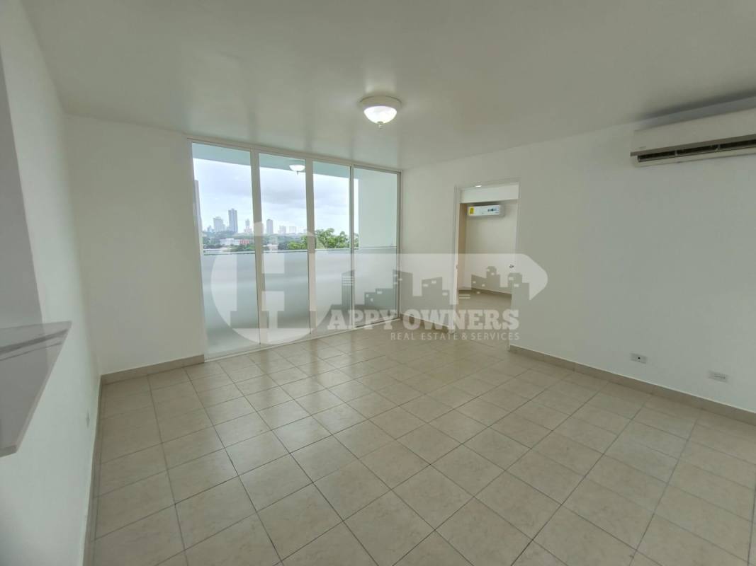 Bright living space opening onto balcony with city views in PH Majestic Garden Edison Park Panama City