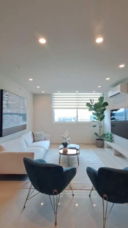 Open living dining with large windows, balcony access PH Lemon Tower Panama City