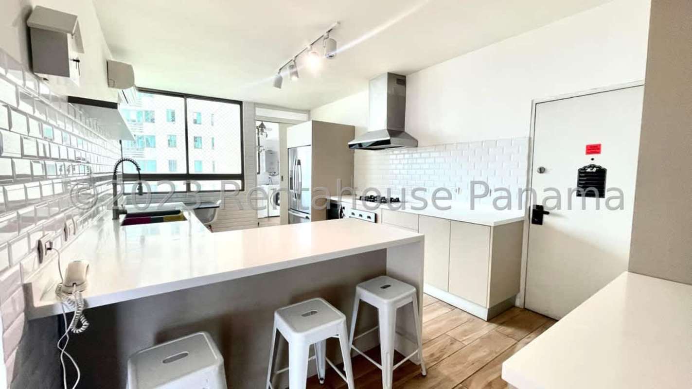 Elegant dining room with city skyline and ocean panorama PH Ocean Park Punta Pacifica Panama