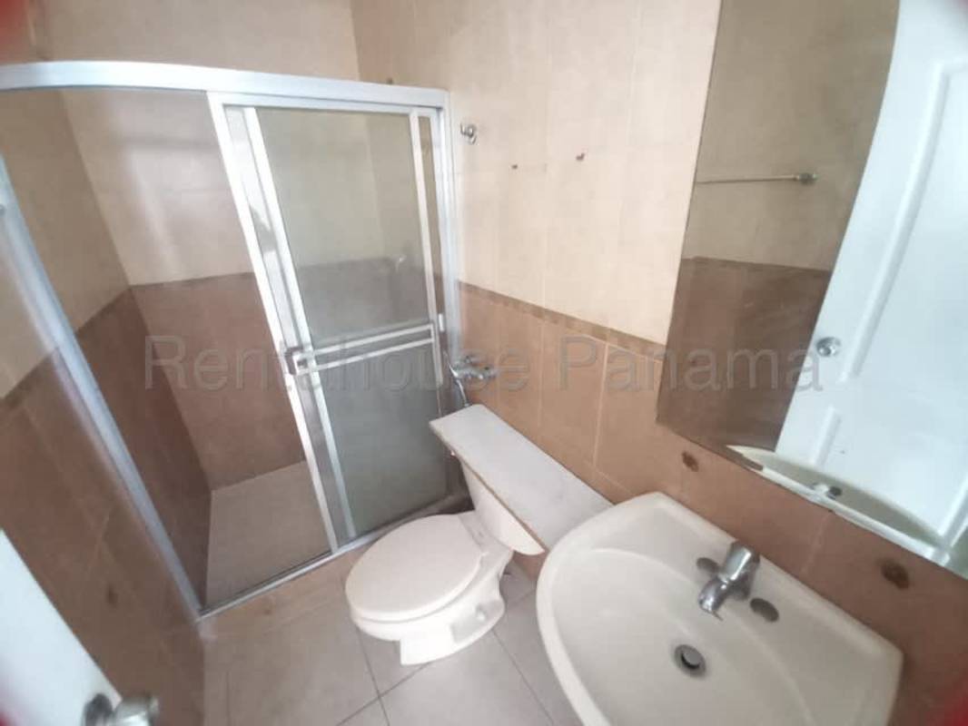 Contemporary bathroom with glass shower, tile walls and single sink at PH San Francisco Bay Panama