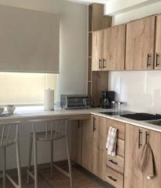 Private outdoor terrace with seating area, umbrella in PH Albrook Residences Panama City