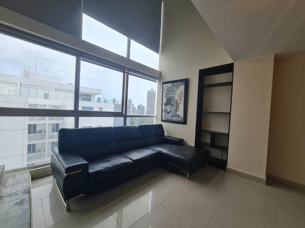 Loft apartment interior double height ceiling living dining Vitro Loft Panama City