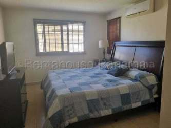 Spacious master bedroom with ensuite bathroom and walk-in closet in Sunset Hills Costa Verde Panama