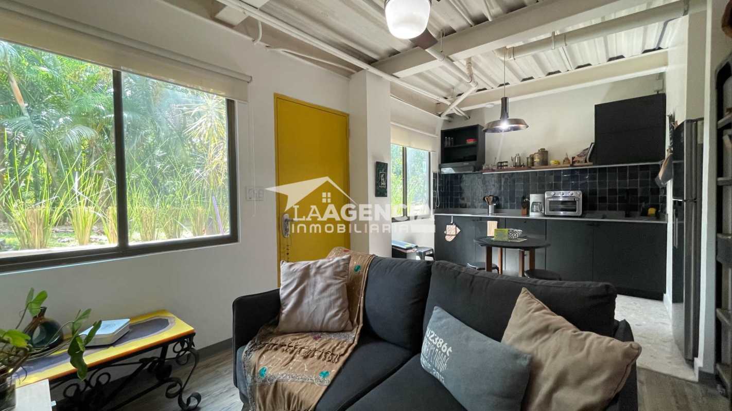 Modern bathroom with walk-in shower and closet area in furnished studio Clayton