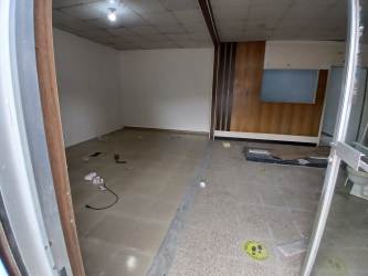 Partitioned interior view of commercial unit with tiled floors in Panama