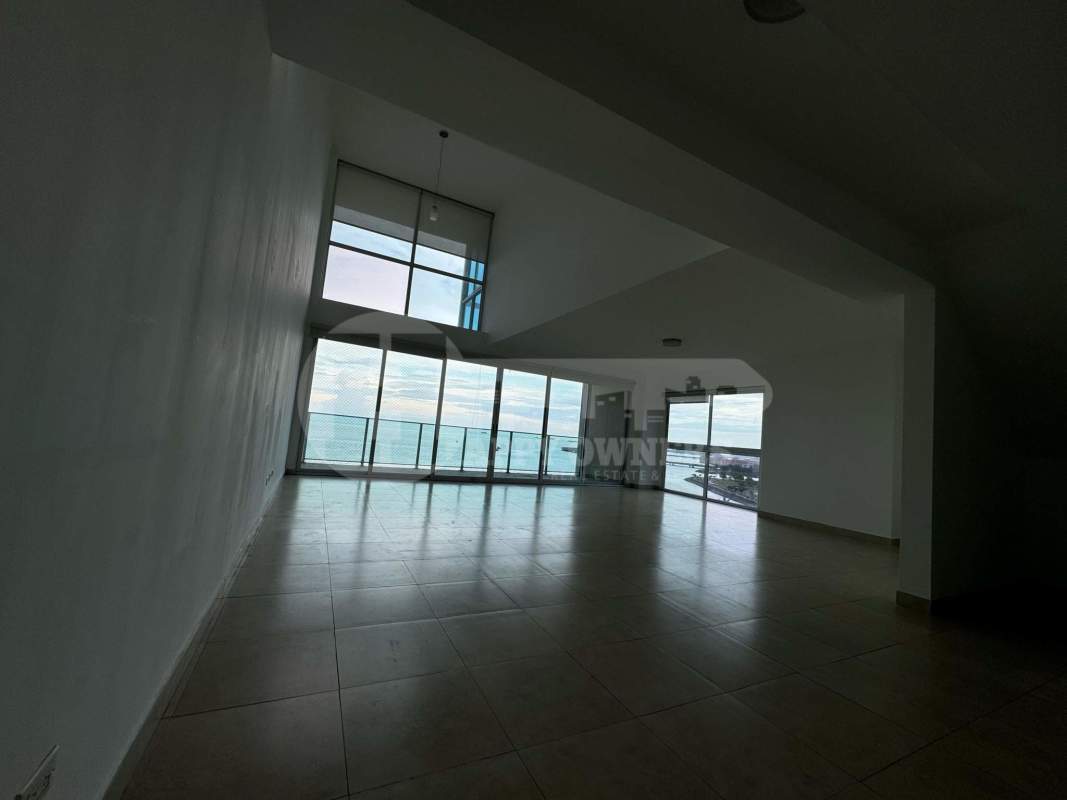 Loft area overlooking large ocean view balcony in PH H2O On the Ocean Panama City