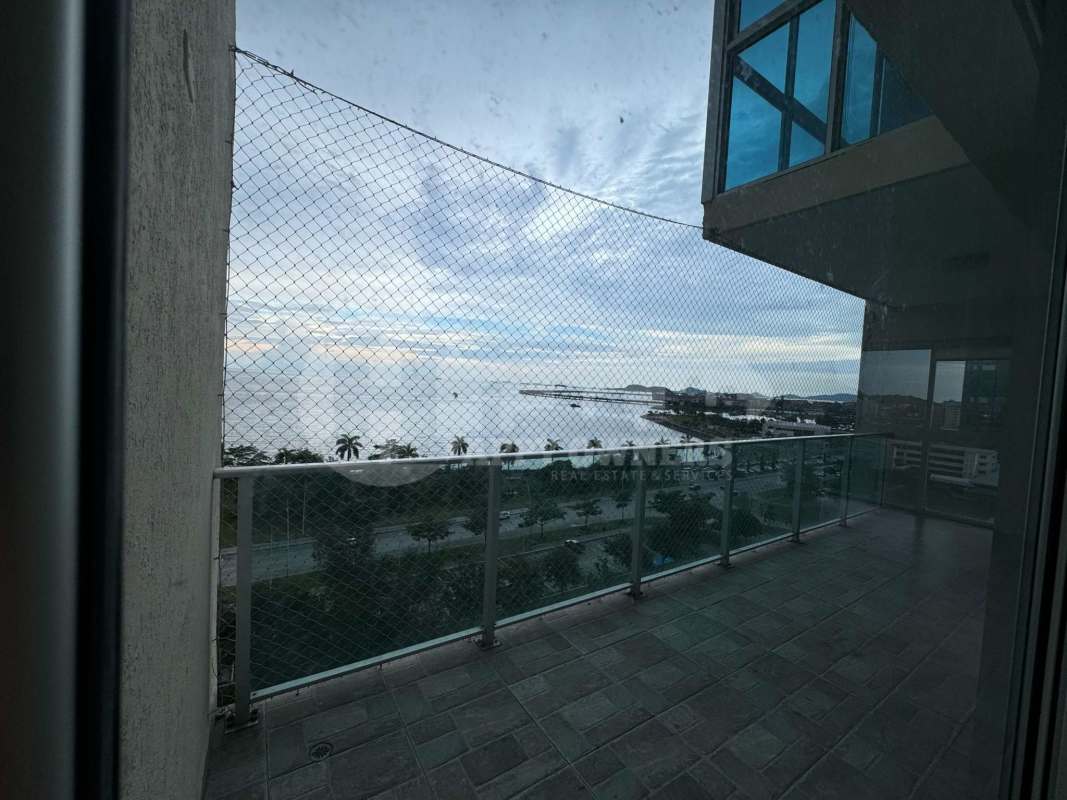 Large balcony with ocean and skyline views at PH H2O On Avenida Balboa Panama City