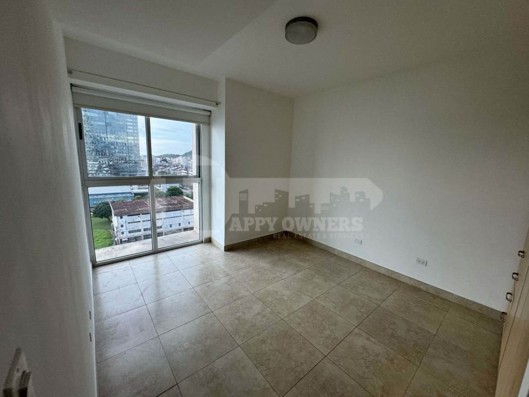 Bedroom with stunning ocean view window at PH H2O On The Ocean Panama City