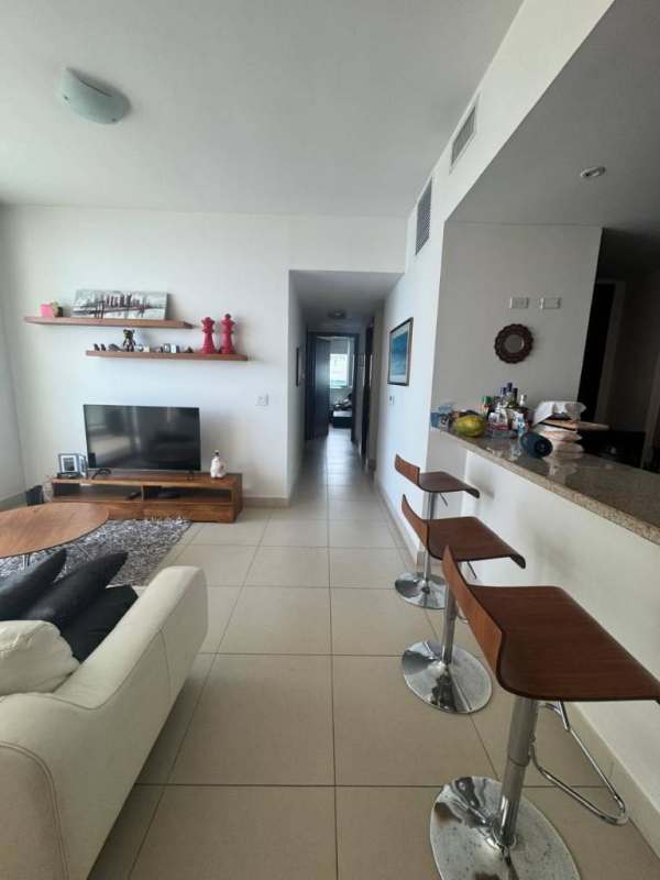 Modern gym with exercise machines and motivational wall inside PH Dupont Tower Panama City