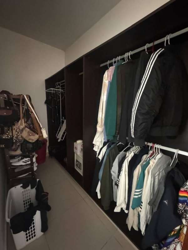 Infinity pool with Jacuzzi, sunbeds, skyline view at PH Dupont Tower Panama City