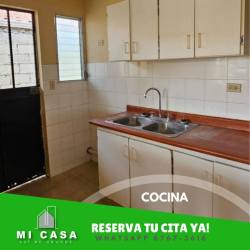 Bedroom with AC unit, beige walls, tiled floor in affordable house for rent Miraflores Penonomé Coclé Panama